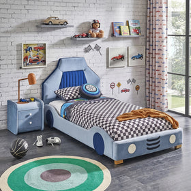 Hamilton Kids Race Car Bed in blue upholstery shaped like a race car with wheel detailing, styled in a children's room with checkered bedding and racing decor - The A2Z Furniture