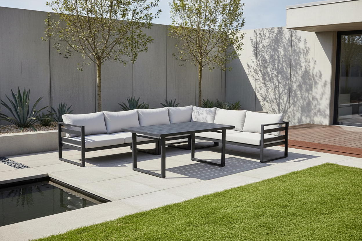 Outdoor furniture set with black frames and white cushions on a white background