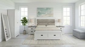 Neatly arranged bedroom with a bed, nightstands, and decor elements.