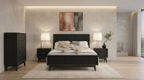Tennyson black fluted bedroom suite with a panel bed, two bedside tables and a tallboy in a softly lit modern bedroom - The A2Z Furniture