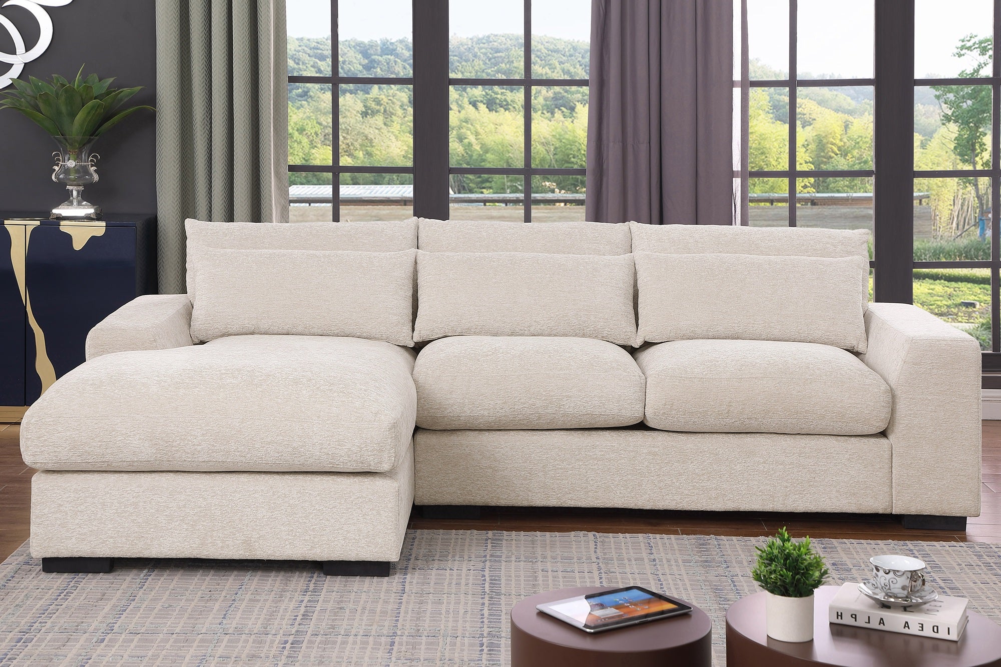 Oxford 3-Seater Couch with Chaise in Dark Grey and Beige – Wide deep seats, plush cushions, and matching pillow – Available in left or right chaise options.
