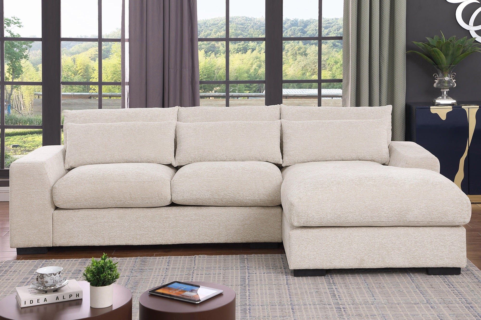 Oxford 3-Seater Couch with Chaise in Dark Grey and Beige – Wide deep seats, plush cushions, and matching pillow – Available in left or right chaise options.
