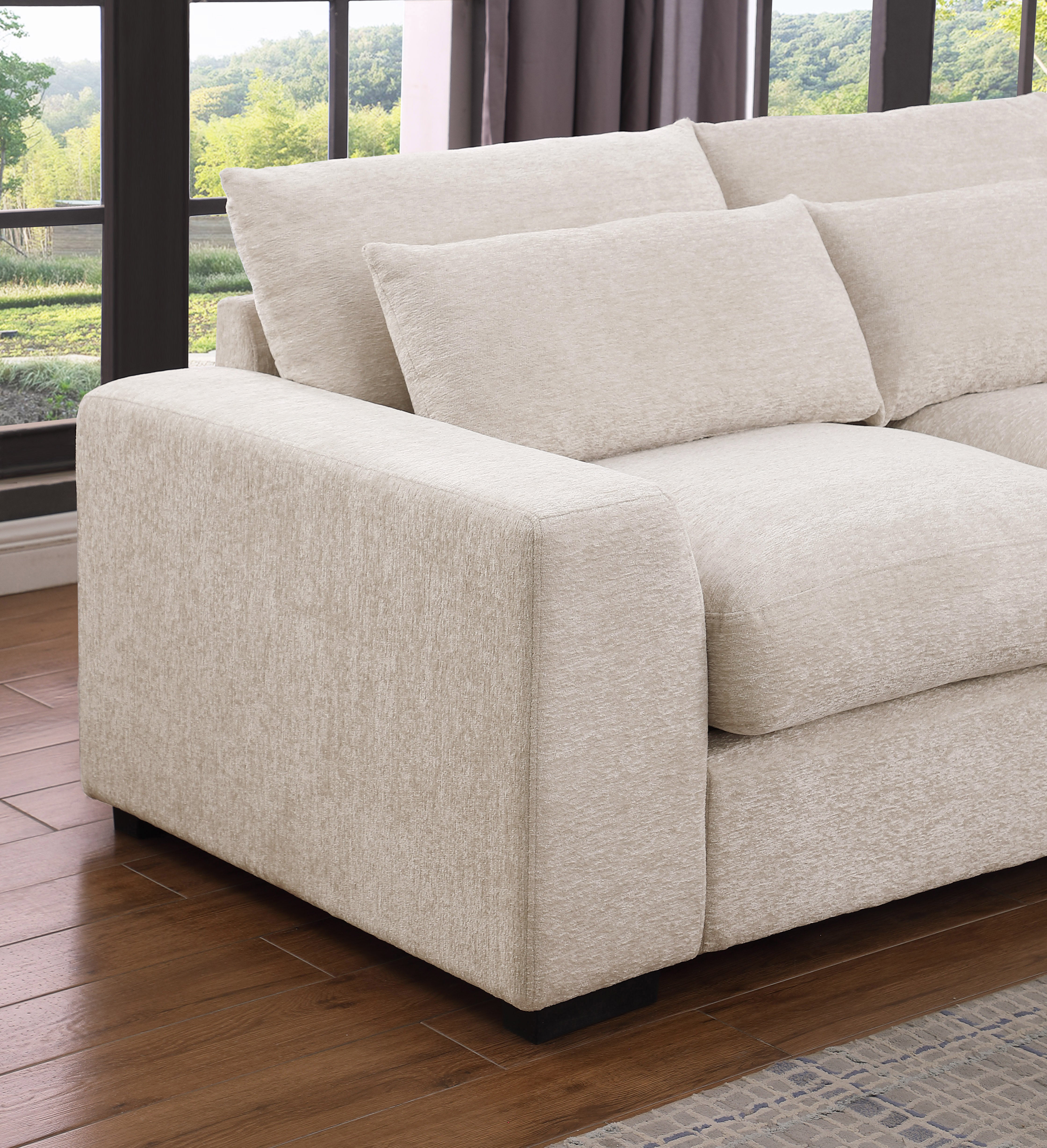 Oxford 3-Seater Couch with Chaise in Dark Grey and Beige – Wide deep seats, plush cushions, and matching pillow – Available in left or right chaise options.