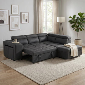 Alice Sofa Bed in charcoal grey fabric pulled out into a bed, with two hideaway storage stools tucked beside the armrest and adjustable headrests