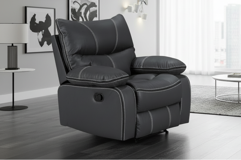 A black Brooke recliner chair with plush cushions, shown in a living room setting.