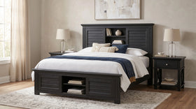 Warwick 3 Piece Bedroom Suite in black timber with louvre-panel bookcase storage bed and two matching bedside tables, styled in a neutral bedroom - The A2Z Furniture