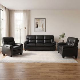 Sebastian 3, 2 and 1 Seater PU Leather Sofa Set in black leather with studded rolled arms, styled in a modern living room