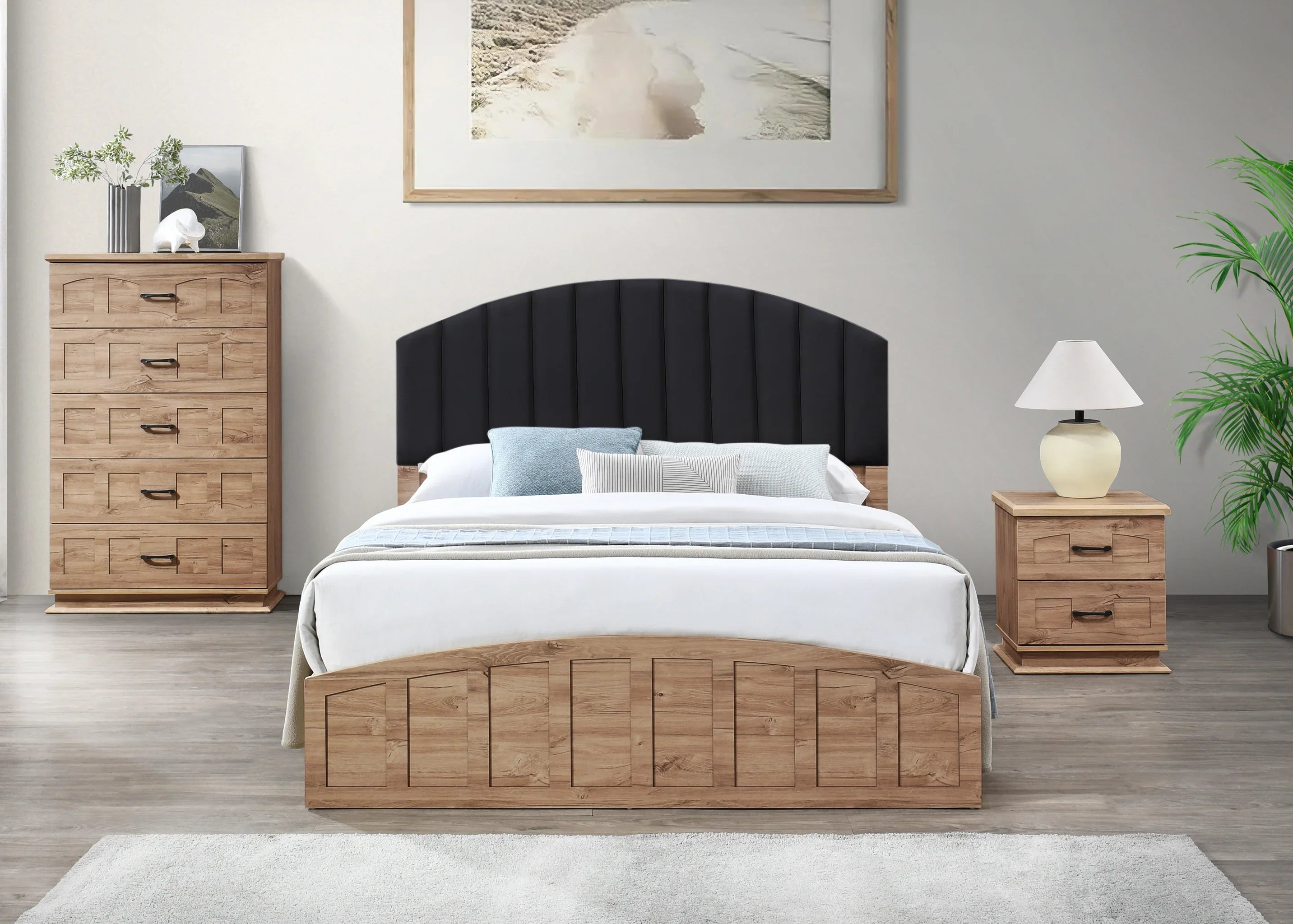 Wooden bed with black headboard in a bedroom setting with nightstands and lamp.
