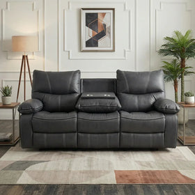 Brooke 3 Seater Recliner Lounge in dark grey leather with plush cushions, featuring a middle folding armrest with cup holders, set in a modern living room with neutral decor.