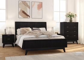 Modern black bedroom suite with queen bed, dresser, bedside tables, and neutral decor.