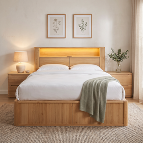 Canberra gas lift bed frame, front view of the plain pale oak headboard with its LED-lit display shelf, flush USB charging port and two push-open storage compartments - The A2Z Furniture