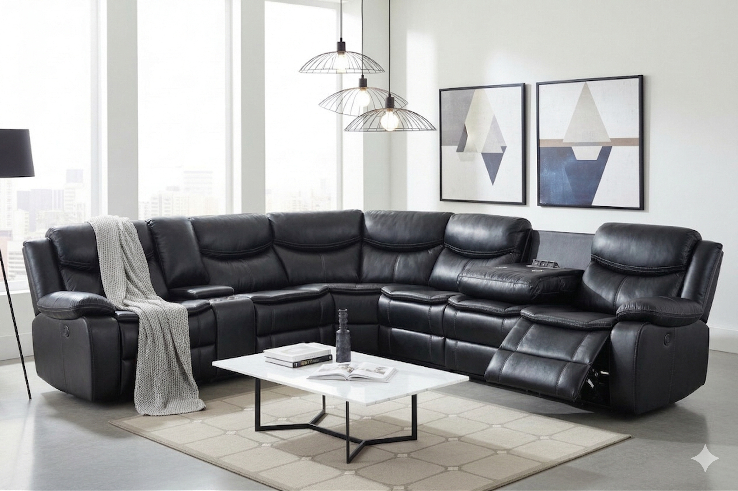 Modern living room with a black leather sectional sofa, white coffee table, and abstract art on the wall.
