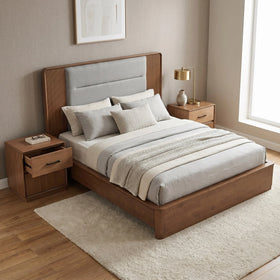 Castle Bed Frame in a modern bedroom setting with a wooden frame, padded headboard, neutral bedding, matching wooden nightstands, and soft natural light from a large window.