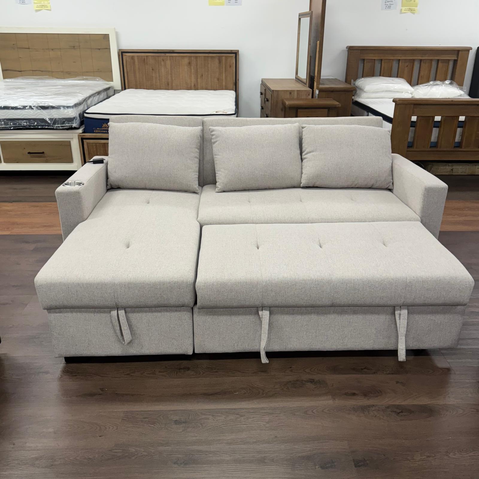 Oasis Sofa Bed with reversible chaise, hidden storage, USB port, and cupholder – available in Dark Grey and Beige at The A2Z Furniture.