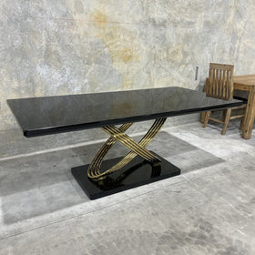 Dayboro dining table, black and gold, showroom photo