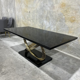 Dayboro dining table, black and gold, showroom photo