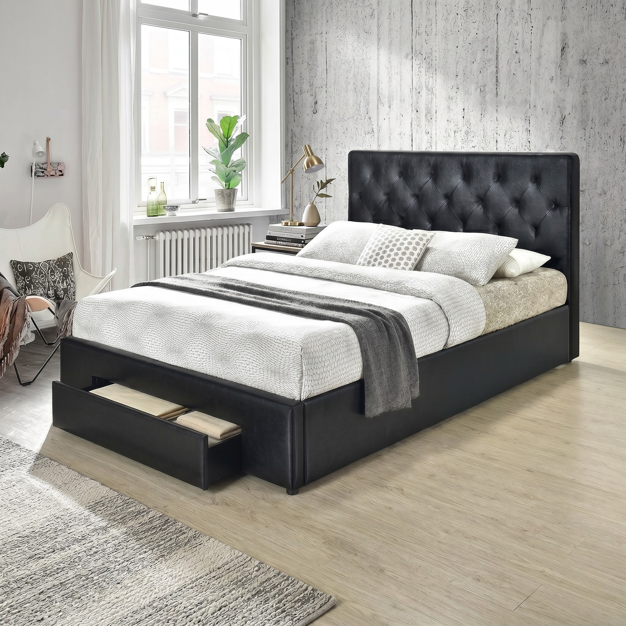 Black PU upholstered bed with storage drawers in a modern bedroom setting.