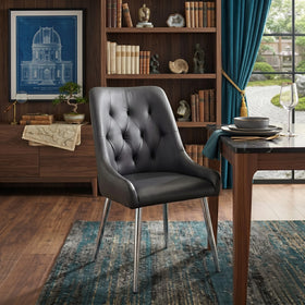 Danna dining chair in black leather-look upholstery with a tufted back and brushed chrome legs, in a study-style dining room - The A2Z Furniture