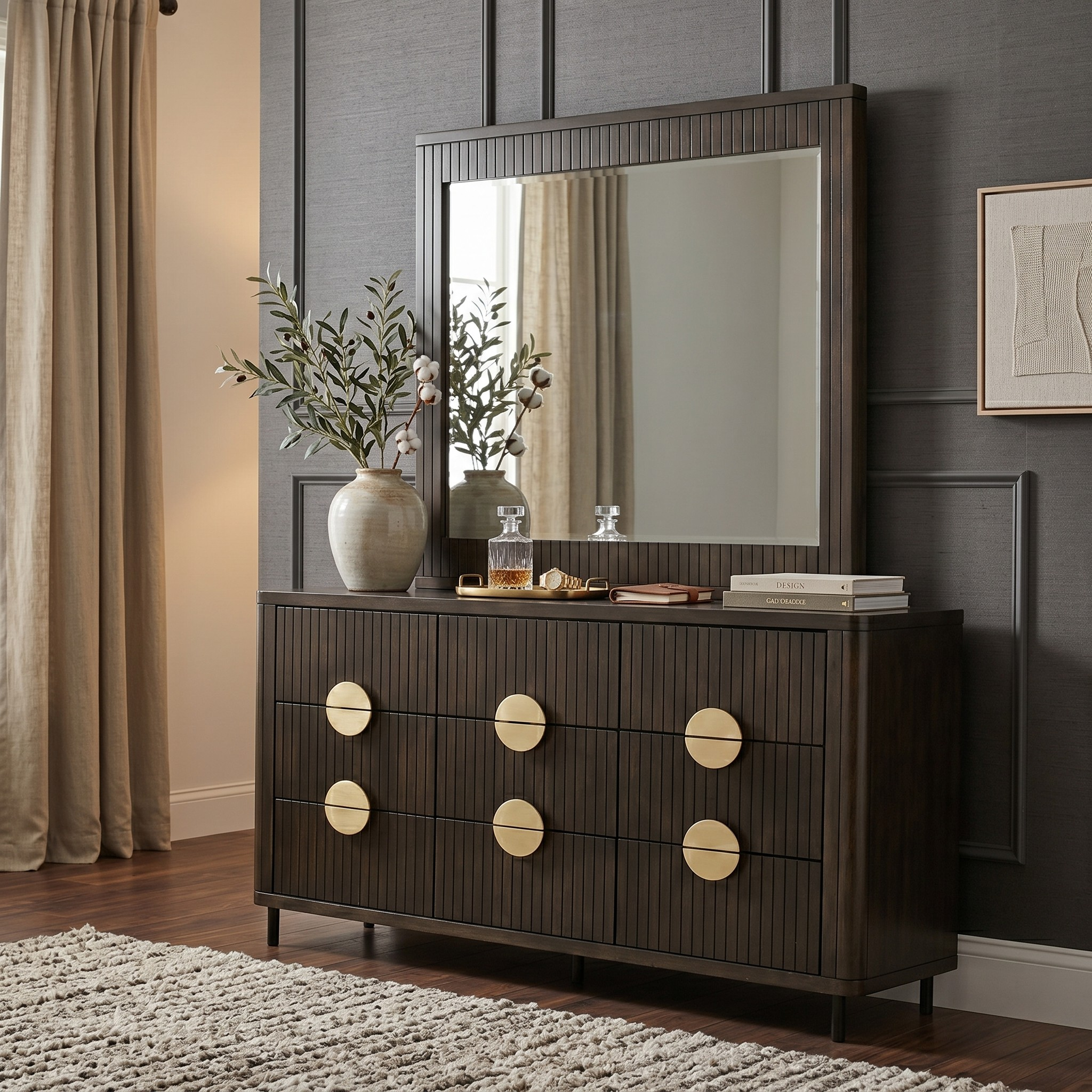 Wooden dresser with round gold handles in a room setting
