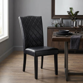 Daybreak Chair in black faux leather with diamond-quilted back and dark legs, shown beside a timber sideboard and dining table - The A2Z Furniture
