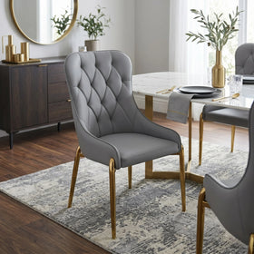 Davidson dining chair in grey upholstery with a diamond-tufted back, padded armrests and slim gold metal legs, styled in a modern dining room - The A2Z Furniture