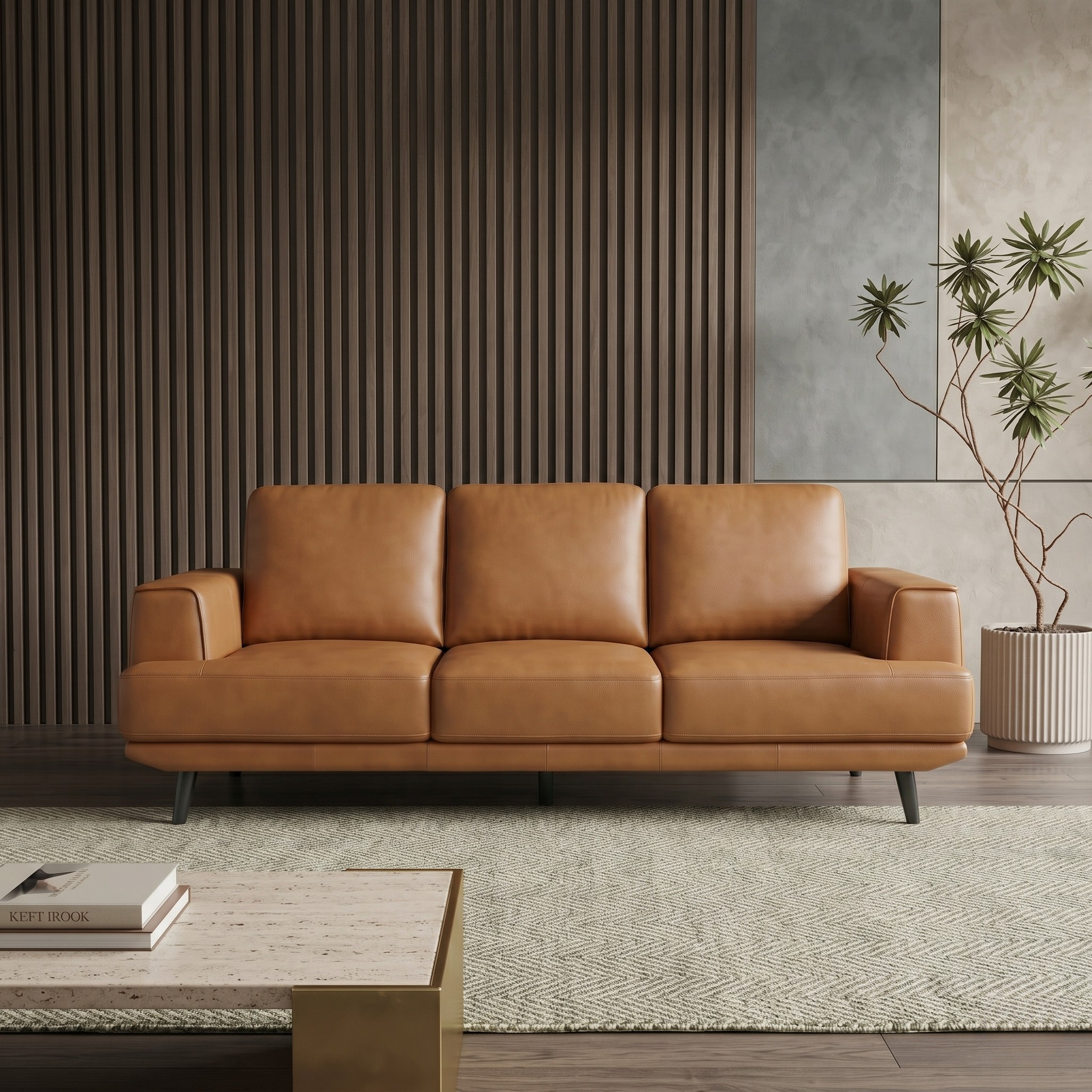 Orange leather sofa in a modern living room with a plant and coffee table.
