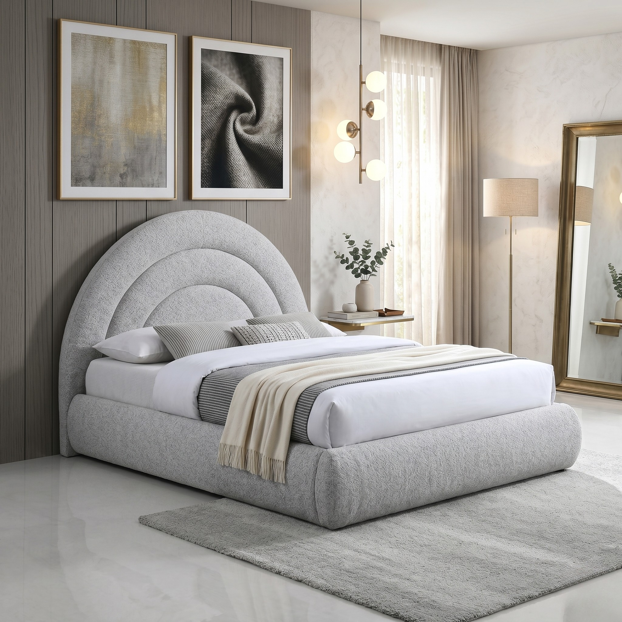 Modern bedroom with a gray upholstered bed, abstract art on the wall, and decorative elements.
