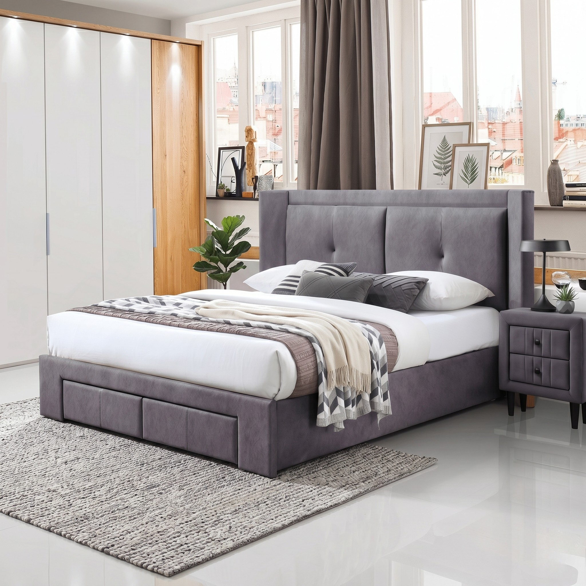 Gray upholstered bed in a modern bedroom with large windows and decor.