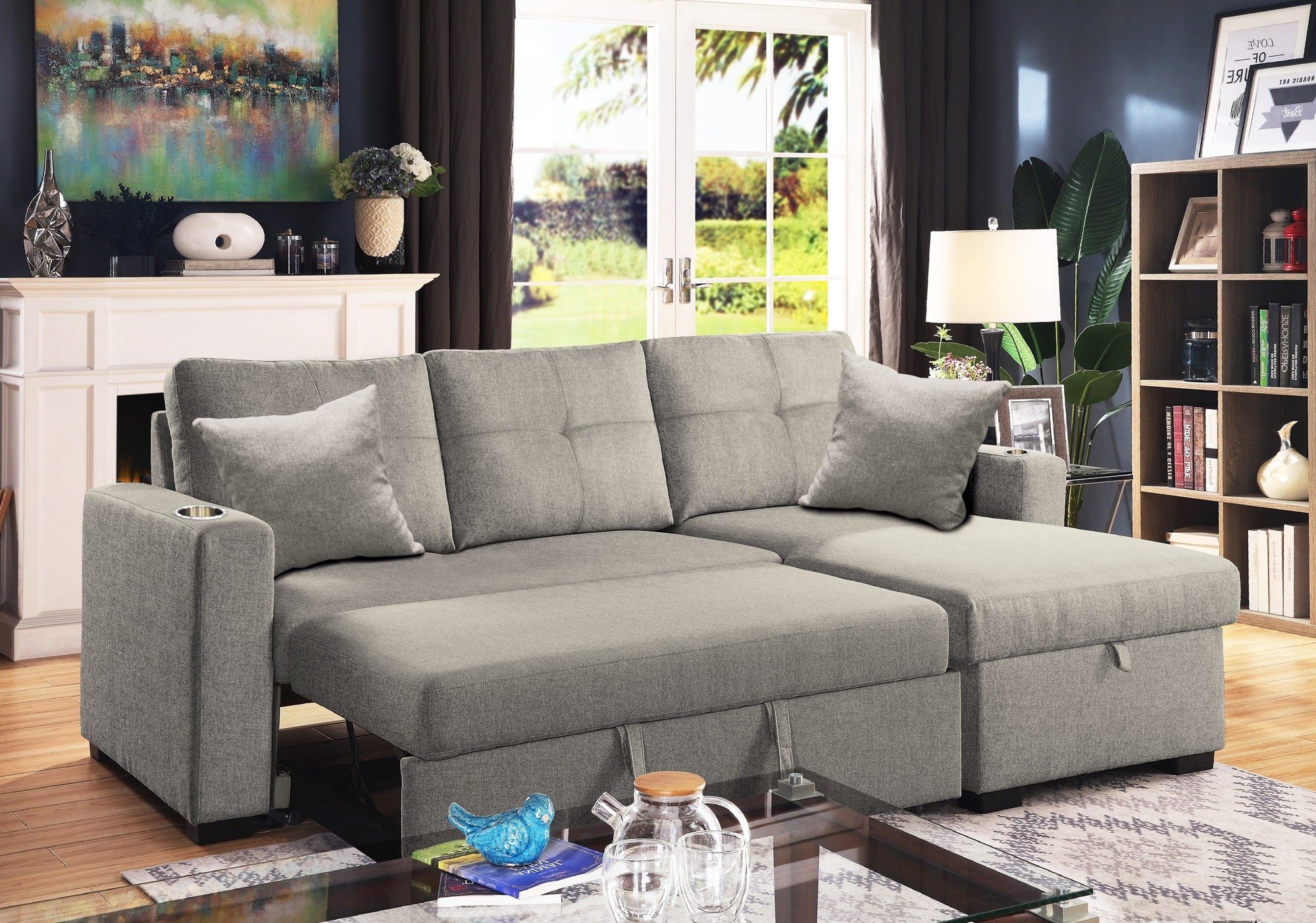  Samson 3-seater fabric sofa bed with chaise lounge in a living room setting.