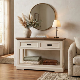 White console table with wooden top in a living room setting