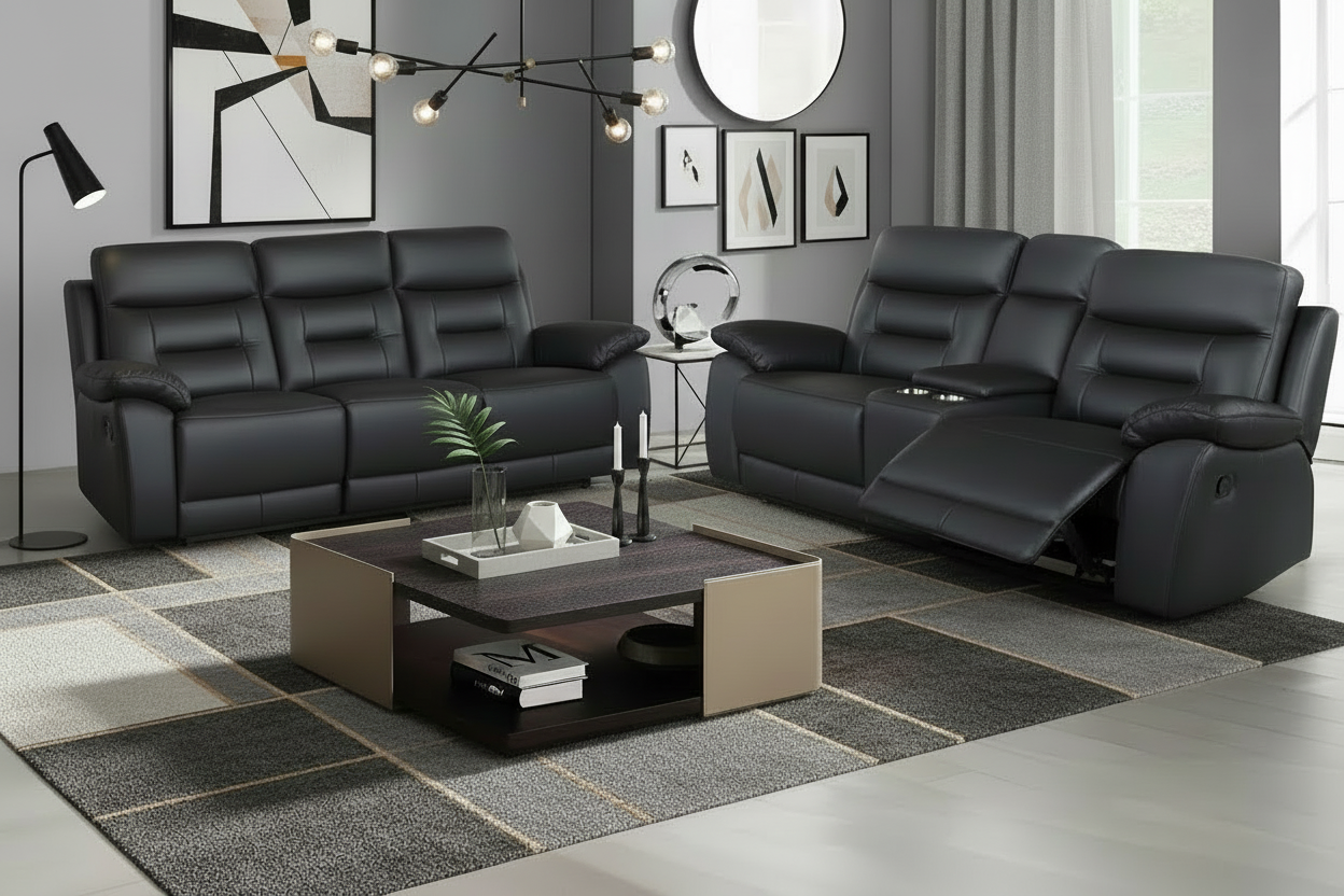 Modern living room with black leather sofas and a coffee table.