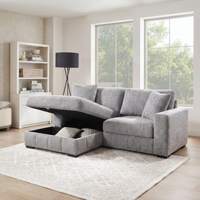 Seaford light grey sofa bed with the storage chaise lifted open