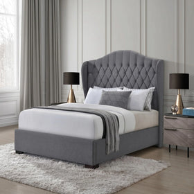 Panda bed frame in grey fabric with a tall buttoned wingback headboard, dressed with white and grey bedding in a soft-toned bedroom - The A2Z Furniture
