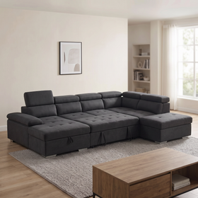 Alex Pull Out Sofa Bed in black fabric with the storage ottoman beside the sofa, adjustable headrests and chaise, in a bright living room