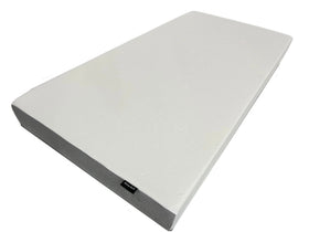 Rectangular foam mattress on a white background