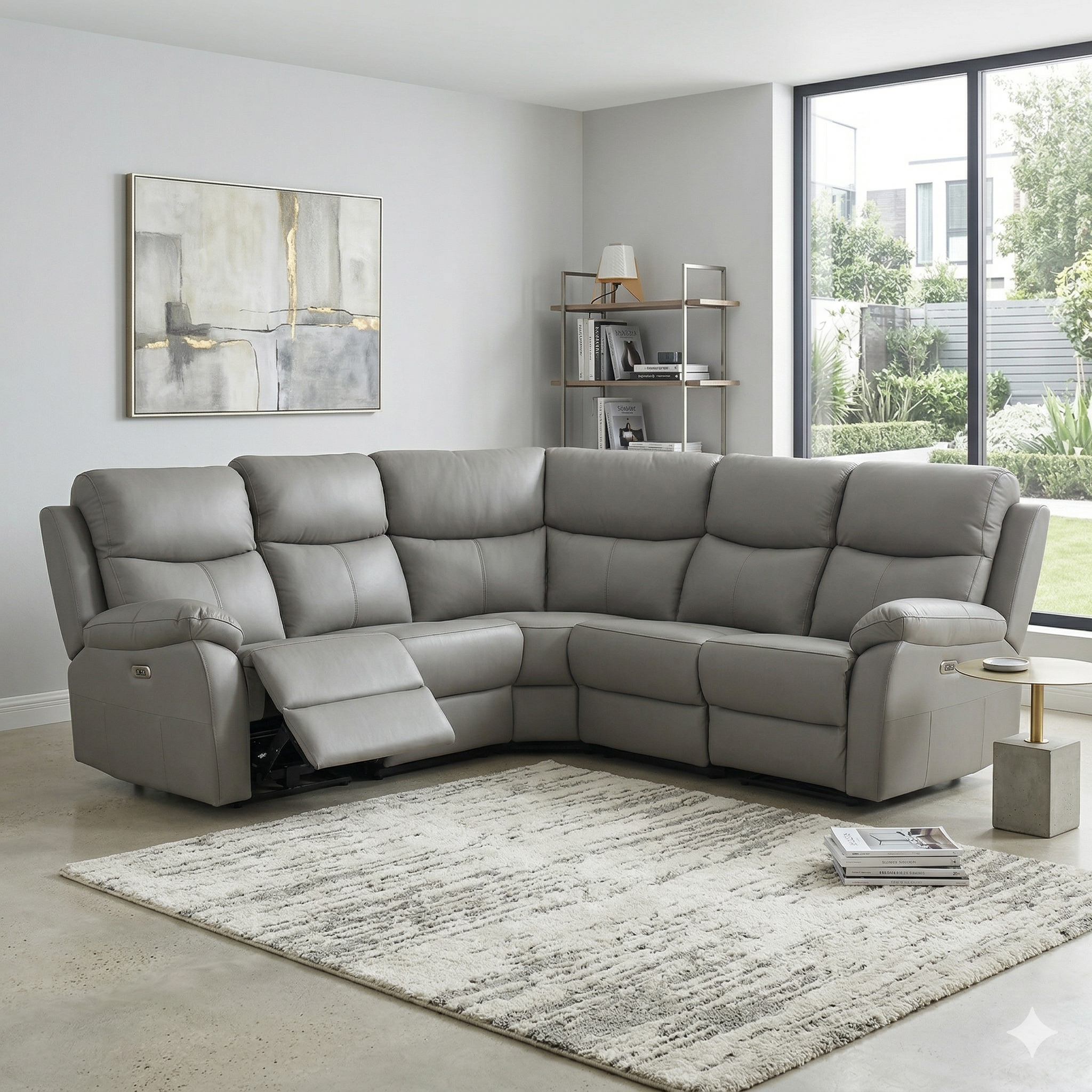 Gray sectional sofa in a living room with a rug and decorative items.