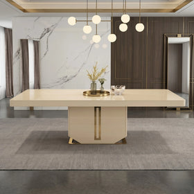Modern dining table with marble wall and chandelier in a stylish room