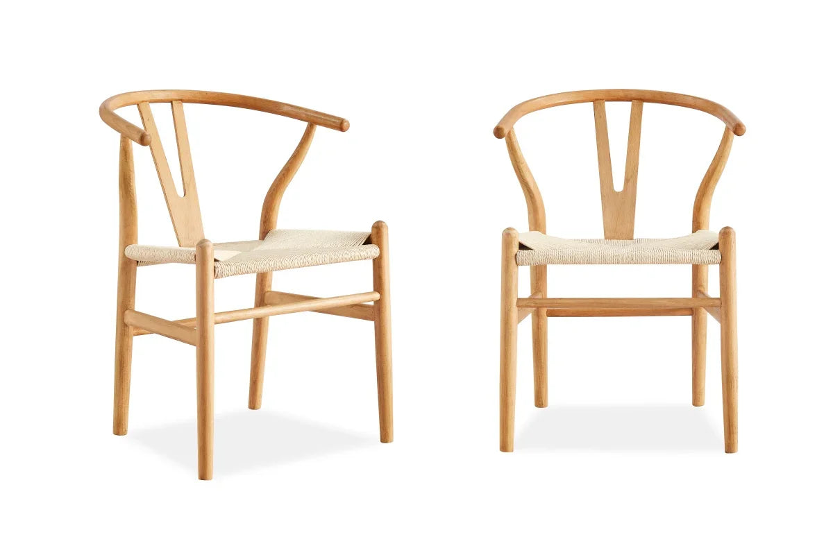 Two wooden chairs with white seats on a white background