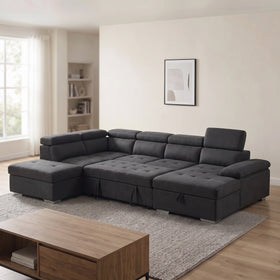 Alex Pull Out Sofa Bed in black fabric, chaise on the right and storage ottoman on the left beside the sofa, with adjustable headrests, in a bright living room