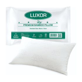 Bamboo Cooling Pillow shown in its Luxor Premium Bamboo Pillow retail pack alongside the white pillow, standard size 48cm x 73cm