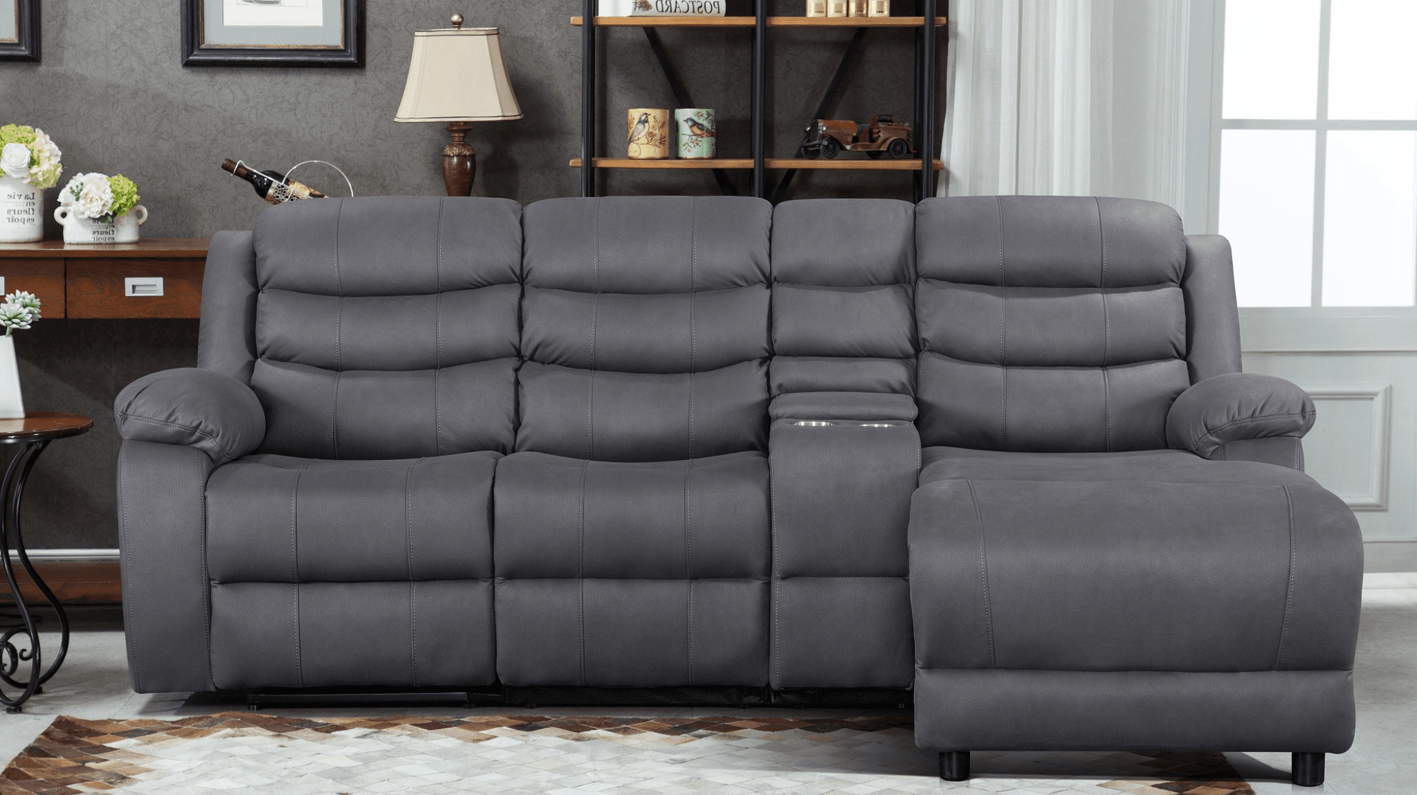 Modern grey sectional lounge with chaise and armrests in stylish living room setting