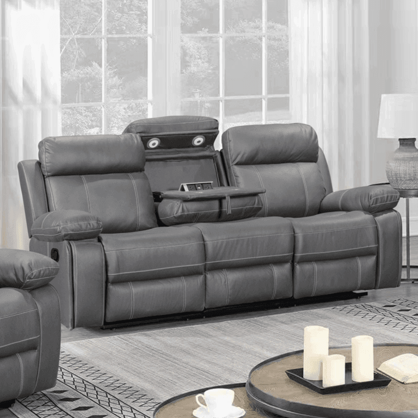 Charcoal grey reclining sofa with cup holders and storage in a modern living room setting