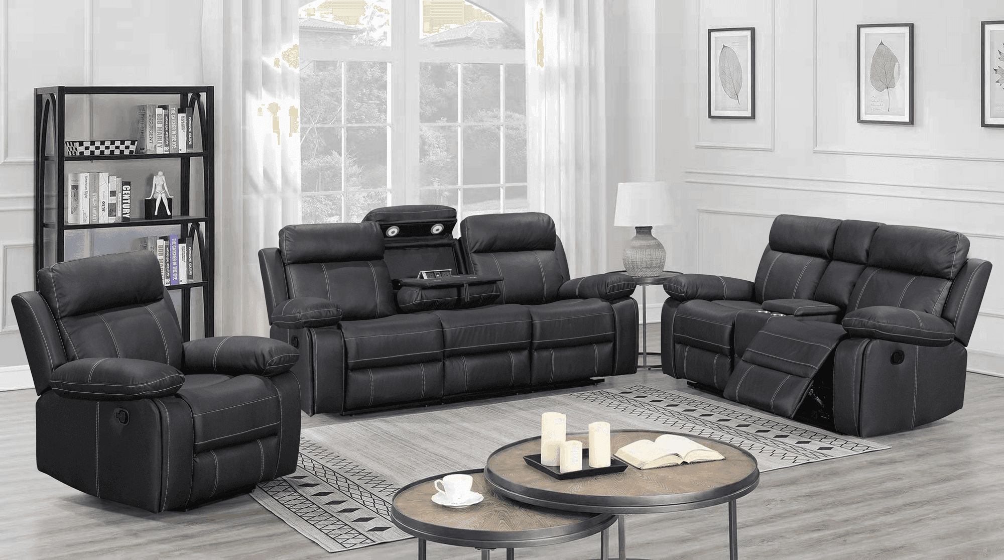 Black leather recliner lounge suite in modern living room with coffee table and bookshelf