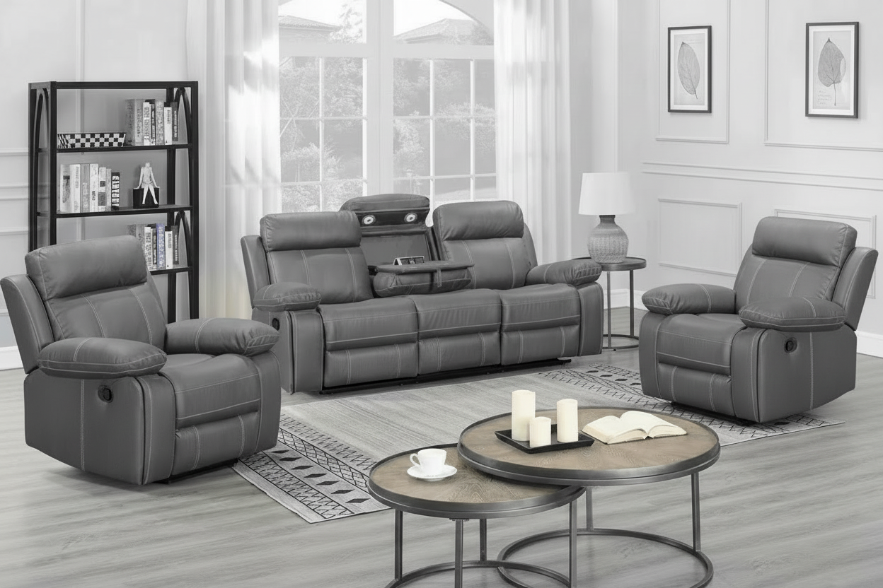 Gray reclining sofa set in a living room with a coffee table and candles.