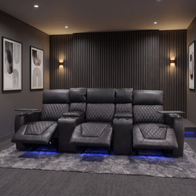 Blair 3-seat theatre recliner lounge with all three seats electrically reclined and footrests raised in a home cinema room