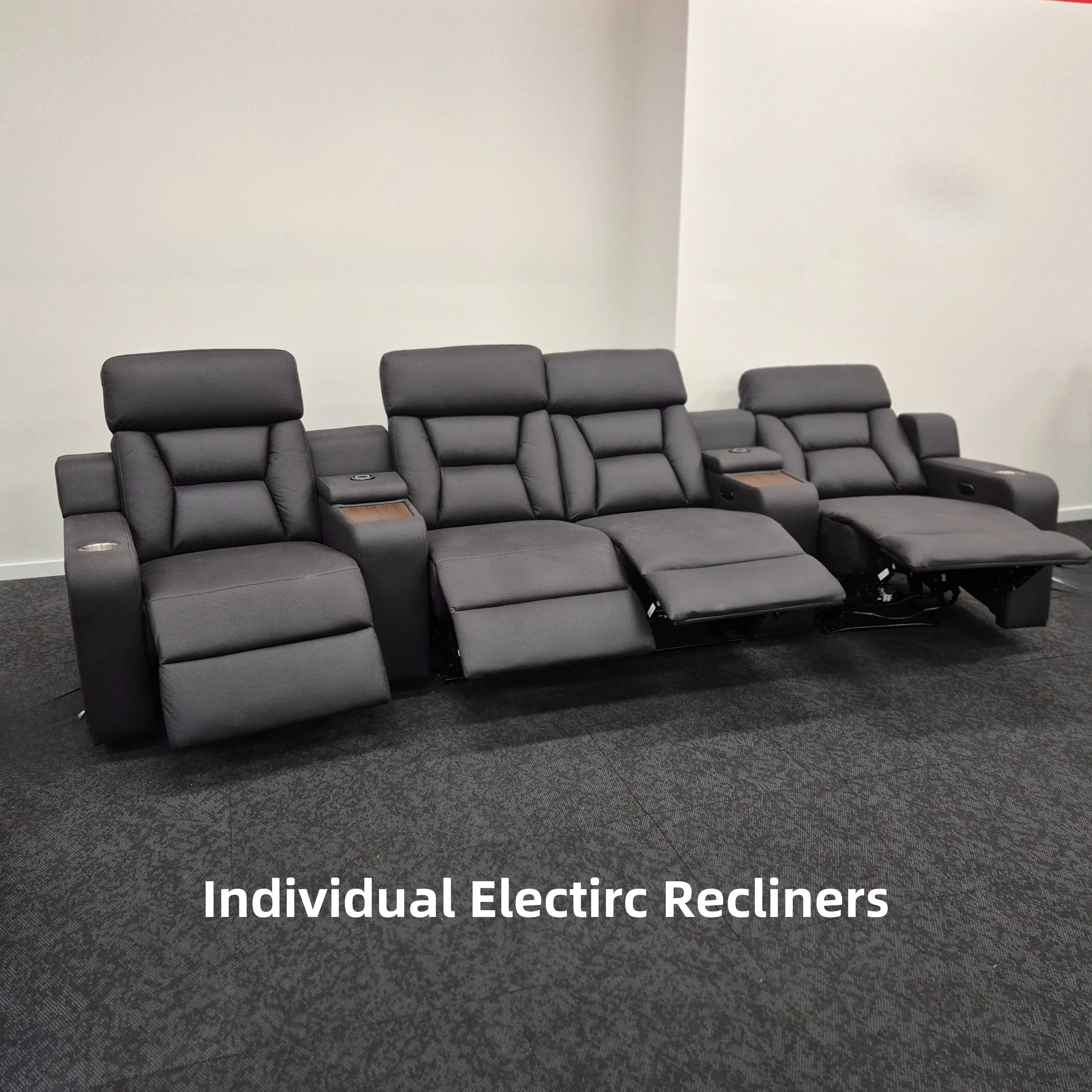 4-seat electric recliner theatre lounge in dark fabric with cup holders and footrests extended