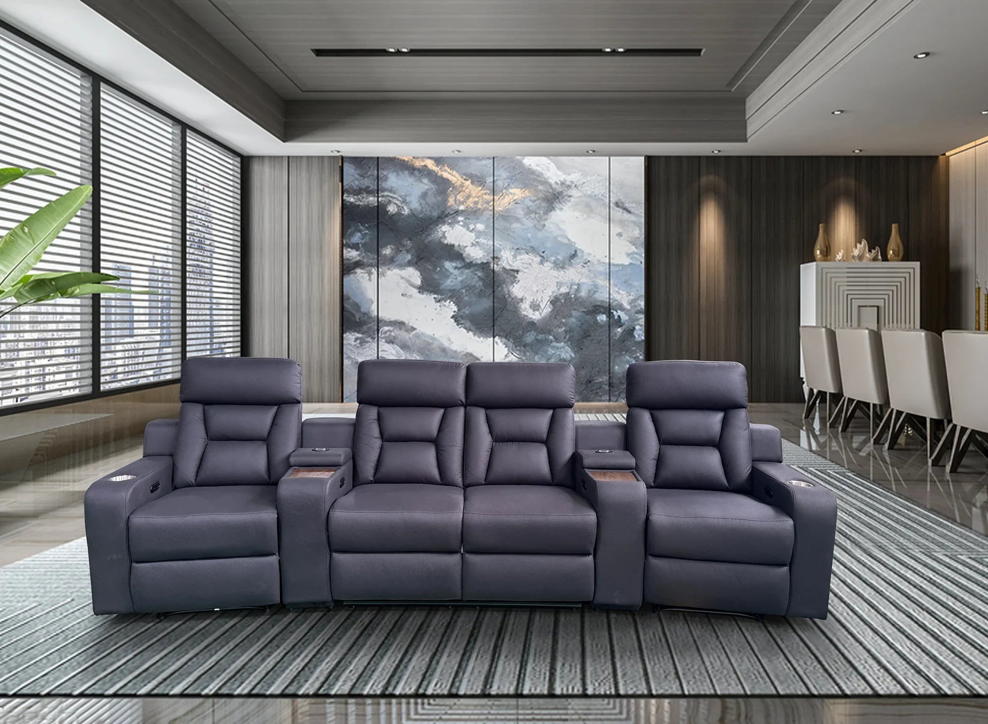 Modern grey reclining lounge suite with cup holders in a stylish living room setting