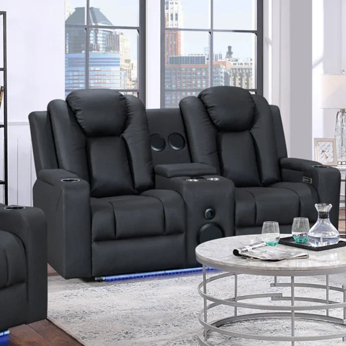 Black leather recliner lounge suite with cup holders and LED lighting in modern living room
