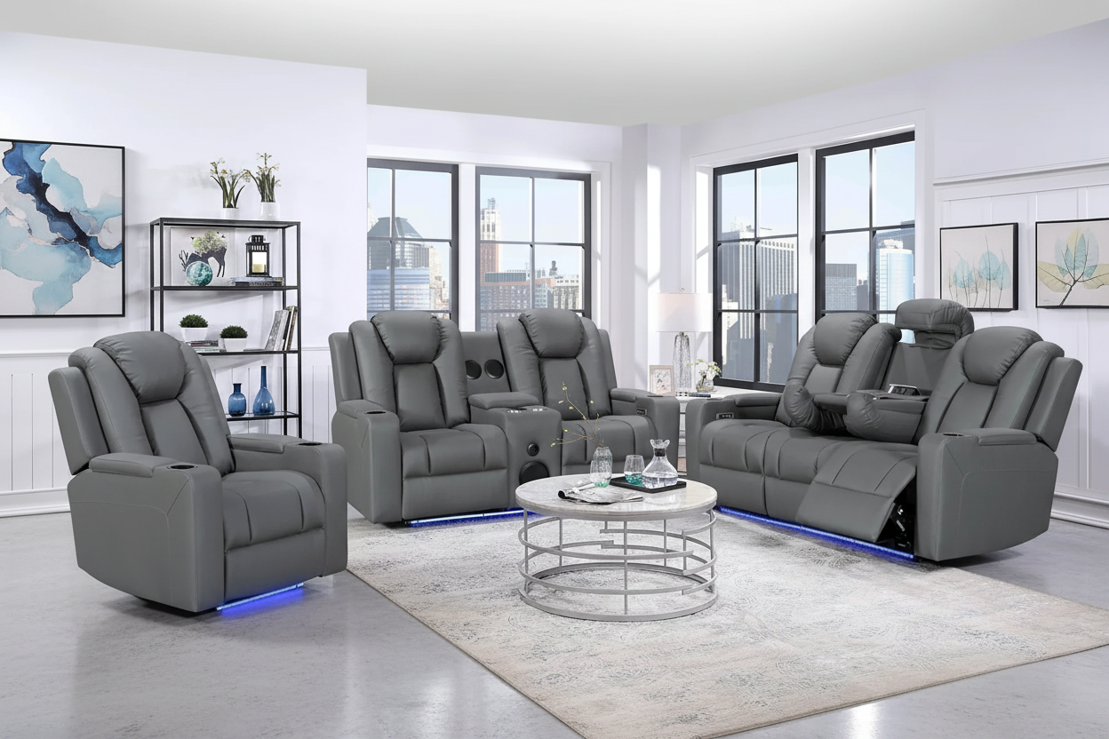 Gray reclining sofa set in a modern living room with large windows.