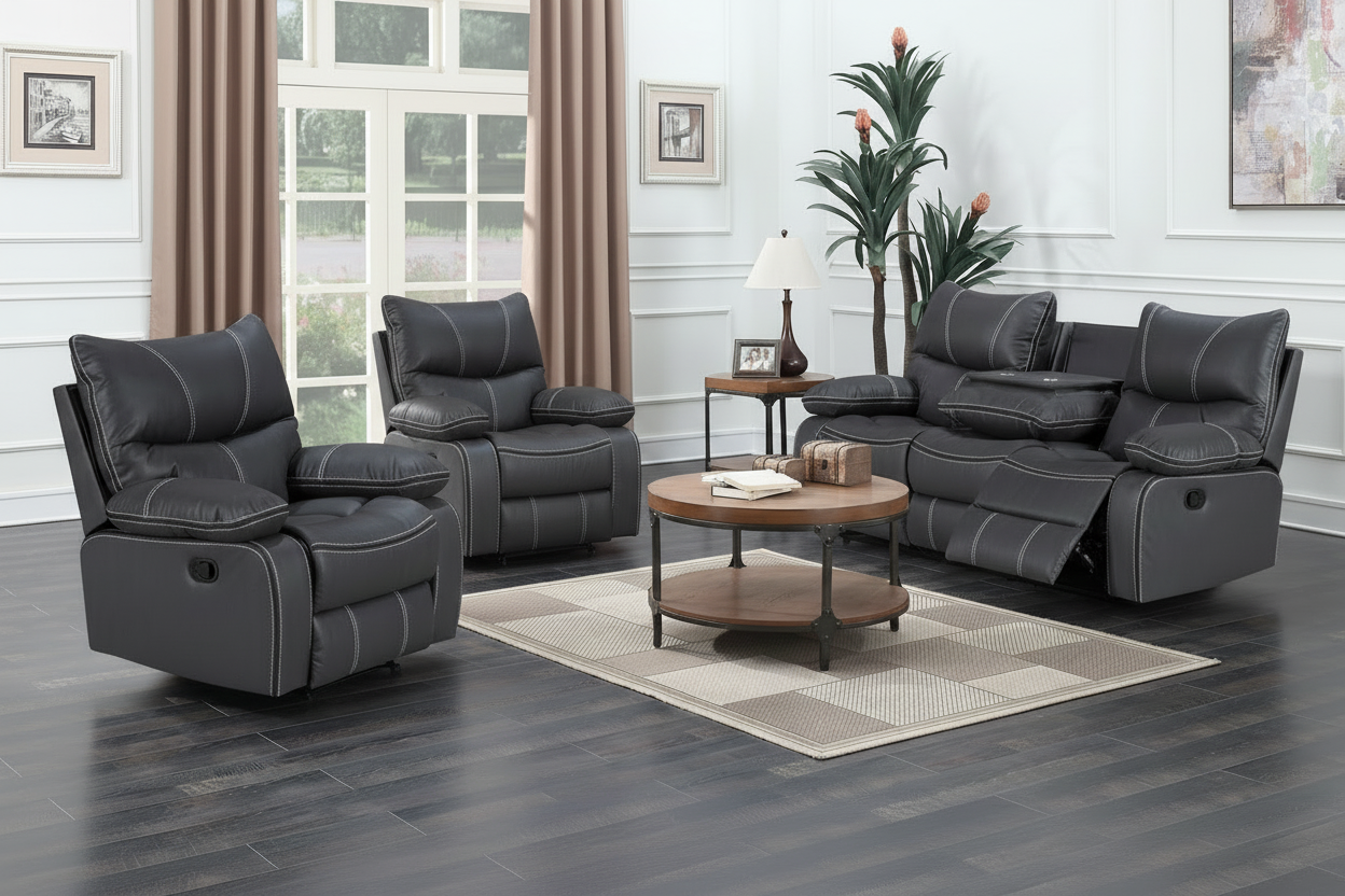 Gray reclining sofa set in a living room with a coffee table and decor.